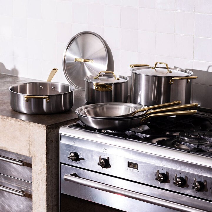 Batterie de cuisine en inox avec manches dorés, 9 pièces